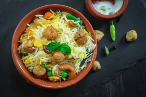 Veg Biryani (half) + 1 chaap