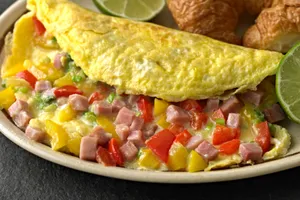 Sweet corn & capsicum bread omelette - butter