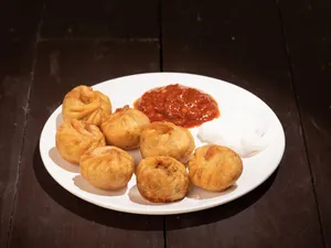 Fried Paneer Corn Atta Momos