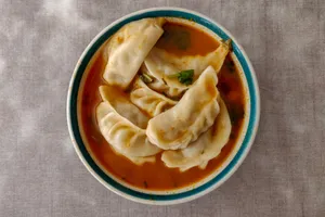 Gravy Paneer Momos - full