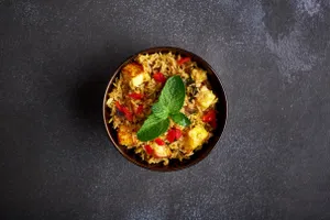 Veg Biryani (half) + 1 chaap