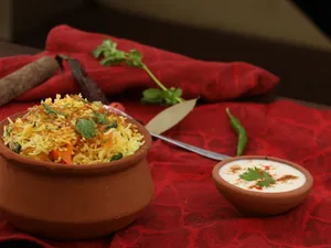 Veg Biryani (half) + 1 chaap